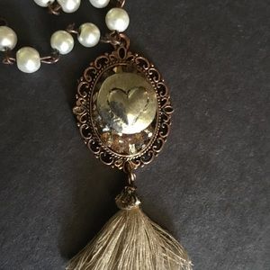 Pearl with antiqued heart charm with tassel